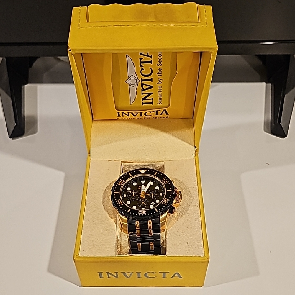 Invicta Gold and Black Timepiece